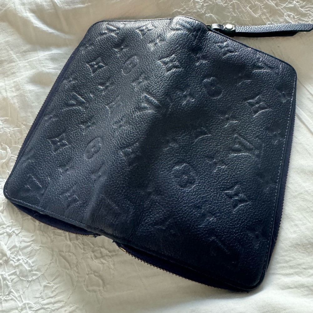 Used but in good condition CELESTE MONOGRAM ZIPPY LOUIS VUITTON WALLET.